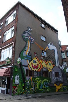 a large building with some graffiti on it