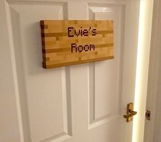 a door with a sign on it that says eve's room