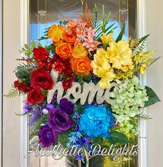 colorful flowers in front of a door with the word mom spelled on it's side