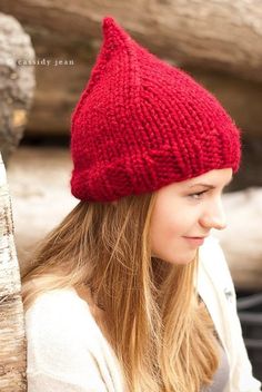 "Style: Gnome style pointy hat. Color: This sample hat is shown in Cranberry. You can choose from 34 colors. Please see the last photo in the listing and zoom in for a visual reference of your color choices, then select it from the drop down menu when ordering. Sizes: One size fits average teen or adult head size of 20\" to 23\" (50.5 cm to 58 cm). Fiber Content: 80% acrylic, 20% Wool Characteristics: Chunky, very soft, warm and cozy. Care Instructions: Hand wash, dry flat. Photography by Cassid Mens Hat Pattern, Crochet Hood, Mens Beanie Hats, Diy Textiles, Lion Brand Wool Ease, Yarn Hats, Chunky Knit Hat, Gnome Hat, Mens Hat