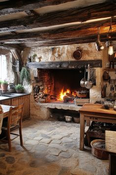 a rustic kitchen with an open fire place