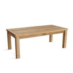 a wooden table with no leaves on the top and one section missing from it, in front of a white background