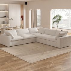 a large white sectional sofa in a living room