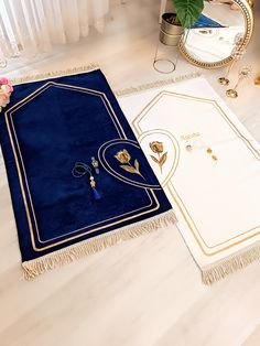 a blue rug with gold trimmings on the floor