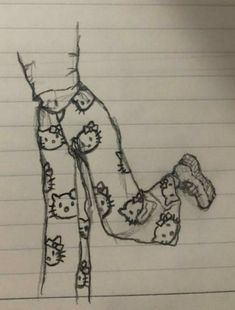 a drawing of hello kitty leggings on lined paper