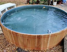 an outdoor hot tub is shown with water in it