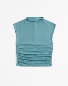 Slim-fitting shell top in our new softAF cotton-modal fabric, with flattering ruching details along the bodice and trendy high-neck detail. Female Features, Business Skirt, Europe Outfits, Shell Top, Shell Tops, High Neck Top, American Clothing, Deep Teal, Swimwear Accessories