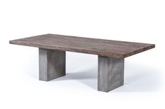 a wooden table sitting on top of a white floor