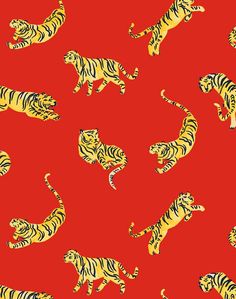 a red background with yellow and black tigers on it