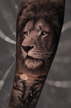 an arm with a lion and elephant on the left side of it, in black and white