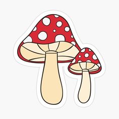 two red mushrooms with white dots on them