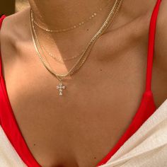 "DETAILS: * Single chain (of choice) with charm * 18k Gold Filled Chain * Singapore Chain Length: 16\" + 1\" extender * Cuban Chain Length: 18\" + 1\" extender * Cross Charm Size: 11mm x 15mm (Extenders are to make the necklace adjustable to wear at different lengths) ►WHY GOLD FILLED? If you have been on the search for everyday gold jewelry that doesn't tarnish but affordable, gold filled is the best choice! Gold filled jewelry is second best after solid gold jewelry. *Our Gold filled jewelry has an outer layer of 14k or 18k gold that is pressure bonded to a base metal of jewelers brass or sterling silver. *This type of jewelry is made for everyday use of stacking or layering different pieces. * Our gold filled jewelry can withstand normal body sweat, body oils, and is typically water res Rhinestone Cross Pendant Necklace, Everyday Jewelry Gold, Layered Cross Necklace, Cross Necklace Gold, Layering Jewelry, Zirconia Necklace, School Jewelry, Cubic Zirconia Necklace, Gold Cross Necklace