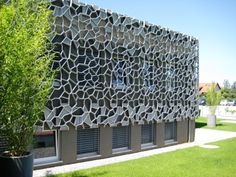 a building made out of concrete blocks and windows