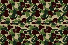 a green and brown camouflage print background