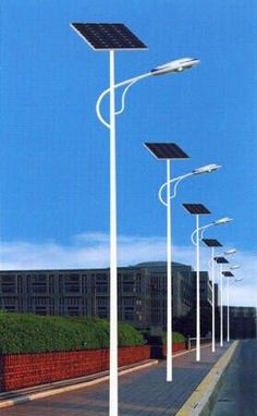 there are many street lights with solar panels on them