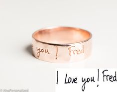 a close up of a ring on a white background with the words i love you, fried