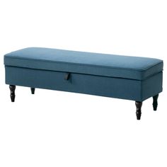 a blue bench with wooden legs and an ottoman