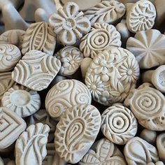 some white rocks with designs on them