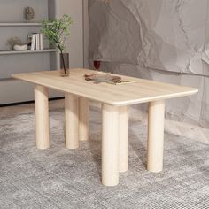 a wooden table sitting on top of a rug