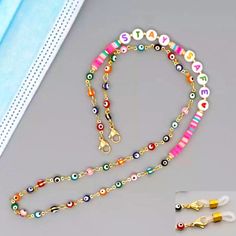 Stay Safe Beaded Necklace Eye Glasses Holder Face Mask Holder Multi-Color Beads Two Silicone Attachments Are Included D31-06 Colorful Glass Bead Necklaces, Multicolor Beaded Glasses Chains As Fashion Accessory, Multicolor Beaded Glasses Chains For Fashion Accessory, Multicolor Beaded Glasses Chain, Pink Necklace With Colorful Beads As Fashion Accessory, Pink Beaded Chain Necklace As Fashion Accessory, Pink Necklace With Colorful Beads, Beaded Mask Lanyard, Eye Glasses Holder