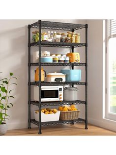 a metal shelving unit filled with lots of food and drinks on top of a hard wood floor