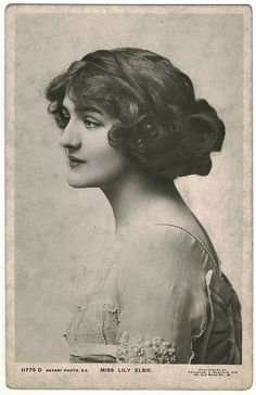 an old black and white photo of a woman