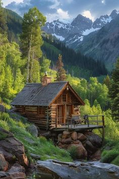 a log cabin in the mountains surrounded by rocks and grass with a stream running through it