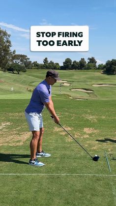 a man hitting a golf ball with a club