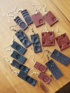 "Leather stamped earrings on earwire, all between 1.75\"-2.5\"" Leather Earrings Ideas, Earrings Bar, Handmade Leather Jewelry, Stamped Earrings, Stamped Leather, Earrings Ideas, Leather Stamps, Camp Ideas, Leather Work