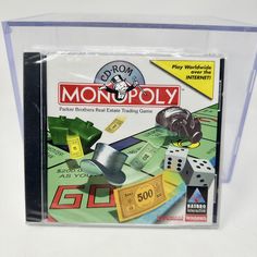 the monopoly board game is in its plastic case