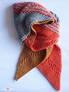 two knitted scarves on top of each other