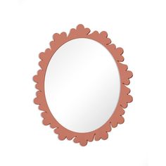 an oval mirror with scalloped edges on a white background, it has a pink border around the edge