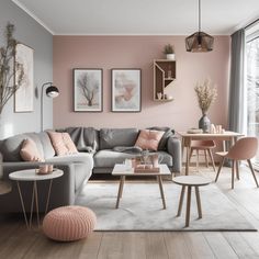 a living room with pink walls and furniture in the corner, including a gray couch