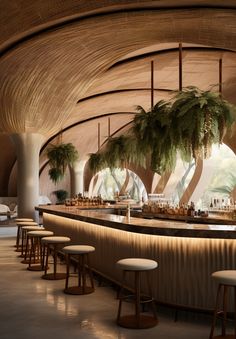 a bar with stools and palm trees in the background