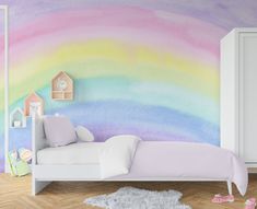 a child's bedroom painted in pastel colors