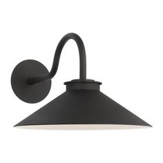 an outdoor wall light with a black shade