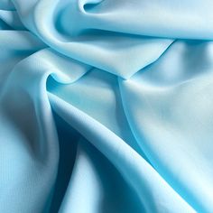 a close up view of a blue fabric