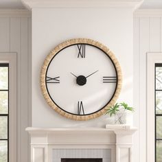 a large clock mounted on the wall above a fireplace in a living room with white walls