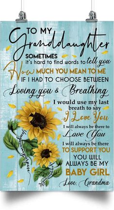 a wooden sign with sunflowers and the words to my granddaughter