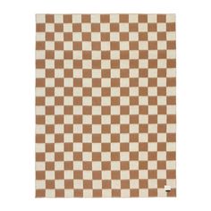 a brown and white checkered rug on a white background