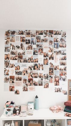 a white desk topped with lots of pictures