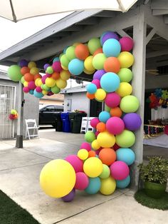 a large number made out of balloons on the side of a building