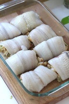 raw fish fillets in a glass dish ready to be cooked