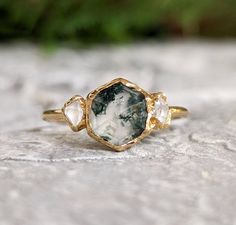 Moss Agate and Herkimer diamond ring in 18k Gold setting Moss Agate Gold Engagement Ring, Raw Gemstone Ring Engagement, Engagement Rings Dark Stone, Moss Agate Hexagon Ring, Multicolor Engagement Ring, Raw Moss Agate Ring, Simple Earthy Wedding Rings, Engagement Ring Inspiration Unique, Moss Agate Marquise Engagement Ring