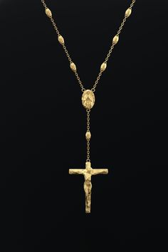 This contemporary rosary necklace is an extraordinary and exquisite way to show your faith. Made of genuine 18K gold, it boasts an elegant design with a faceted surface. The components are connected by a sturdy Forzatin chain, made entirely of solid gold. This Rosary chain is ideal for any event, whether you're seeking a gift for a special occasion or simply want to elevate your everyday style. It's also a wonderful expression of your devotion. 🔆 Product Highlights: 🕊️ Modern Stylized Crucifix Gold Rosary Necklace For Men, Elegant Yellow Gold Rosary With Crucifix, Yellow Gold Cross Rosary As Gift, Gold Rosary Necklace, Gold Necklace For Men, Gold Rosary, Rosary Necklace, Italian Jewelry, Rosary Chain