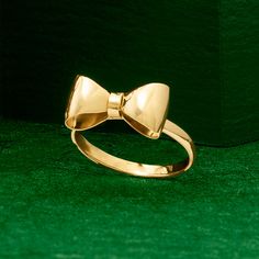 Ross-Simons - Italian 14kt Yellow Gold Bow Ring Size 7. Delicate bows will always be in style! Crafted in Italy, this sweet and shiny bow ring glows in polished 14kt yellow gold. 1/4" wide. 14kt yellow gold bow ring. Yellow Gold Bow Jewelry For Wedding, Yellow Gold Wedding Jewelry With Bow, Party Jewelry In Yellow Gold With Bow Detail, Yellow Gold Bow Jewelry For Anniversary, Yellow Gold Bow Jewelry For Formal Occasions, Formal 14k Gold Jewelry With Bow Detail, Gold Bow Ring For Anniversary, Gold Rings With Bow For Formal Occasion, Gold Bow Rings For Wedding