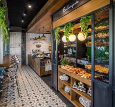 the inside of a bakery with lots of food