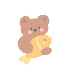 a brown teddy bear holding a yellow fish