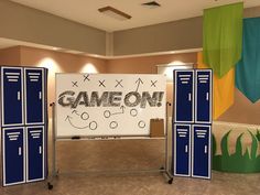 an image of a game on display in a room with blue and white lockers