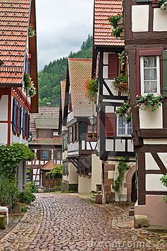 an old cobblestone street in a european village